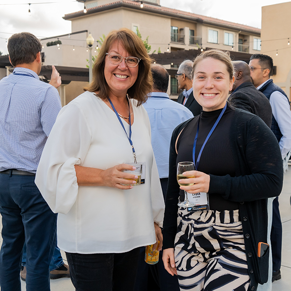 two women networking at ERP Corp SAP Conference